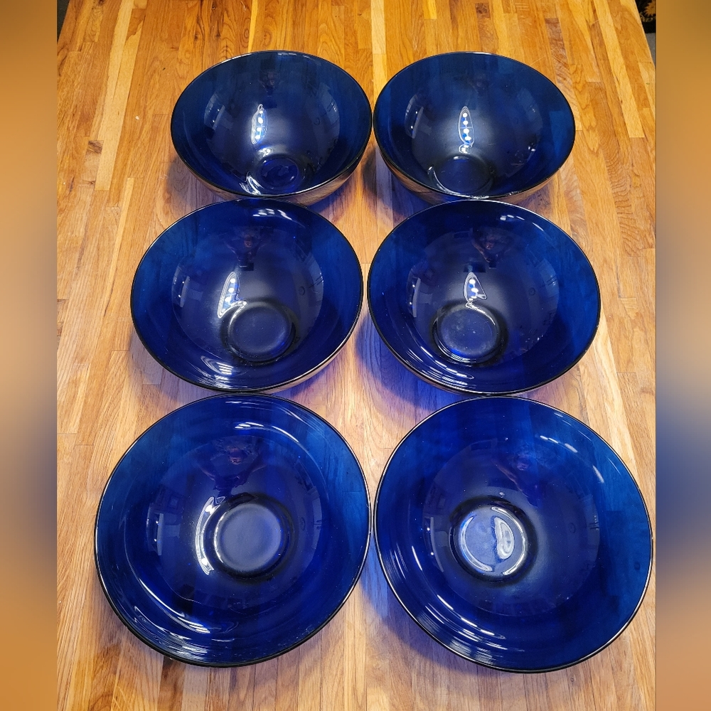 6 blue glass bowls